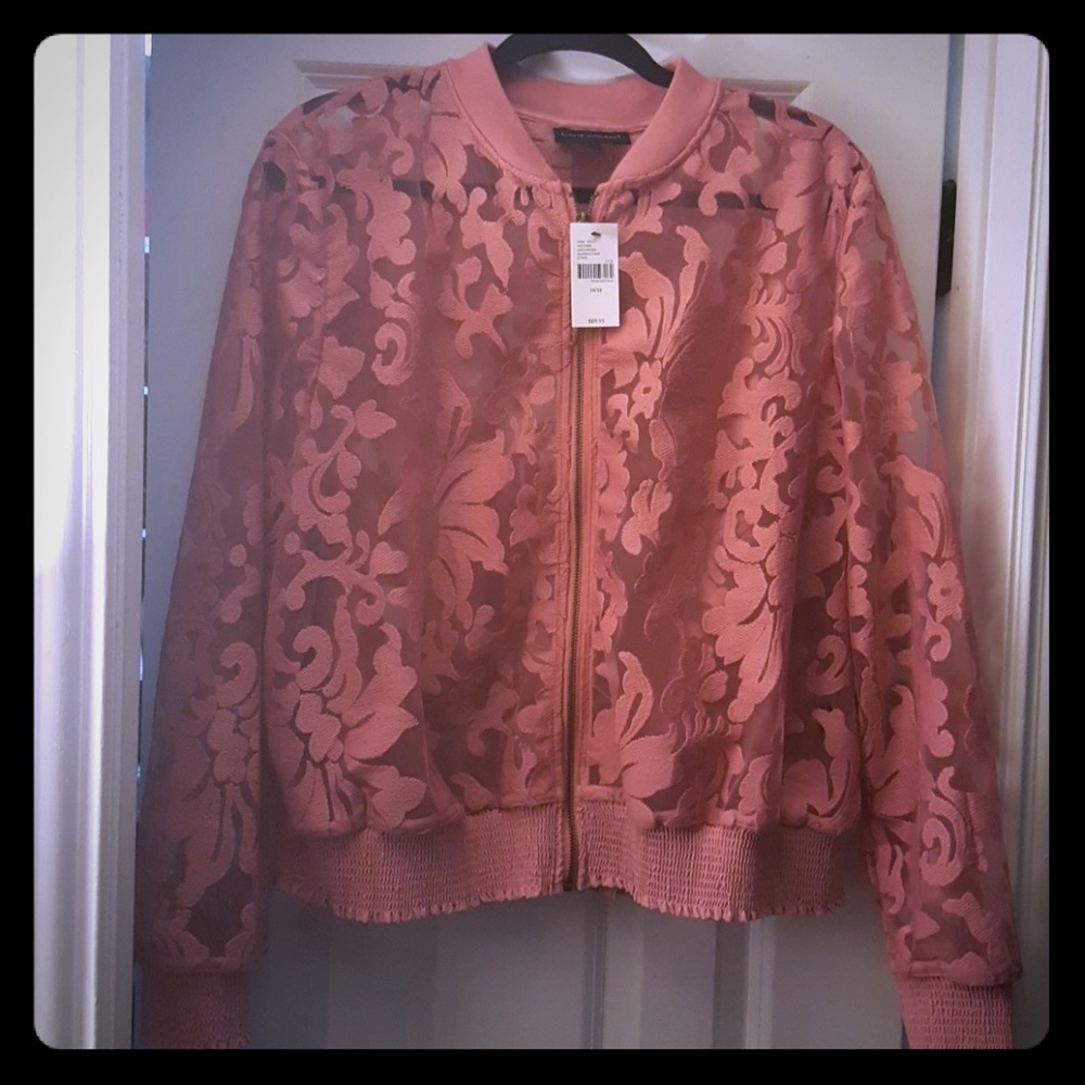 Cute and sexy zip up long sleeve shirt.